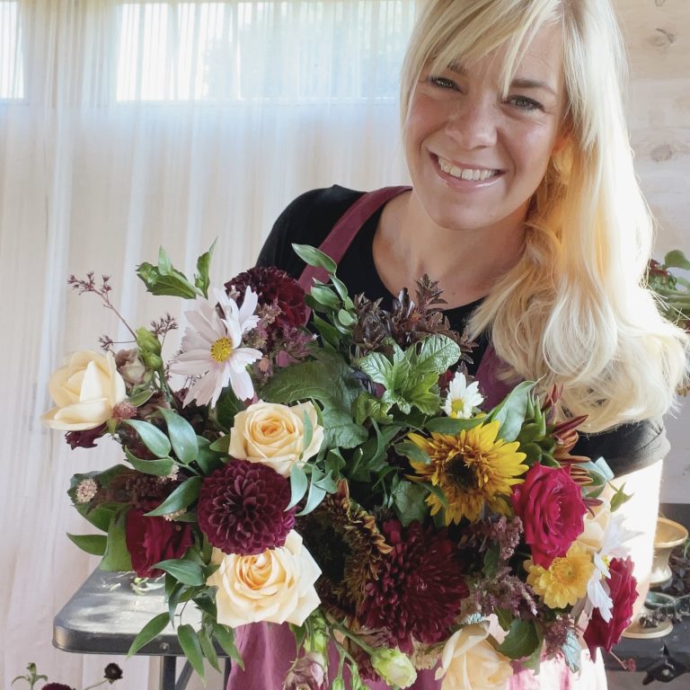 Kara holding an autumn bouquet
